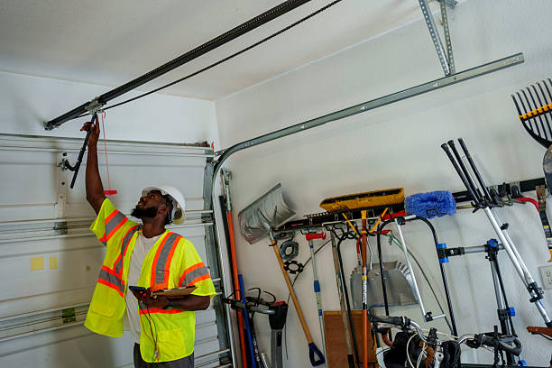 Professional Garage Door Panel Replacement technician working in Millers Falls, MA